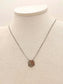 Necklace with pink pendant