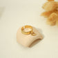 Golden ring with a pendant