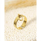 Golden ring with a pendant