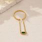 Chain ring with green stone