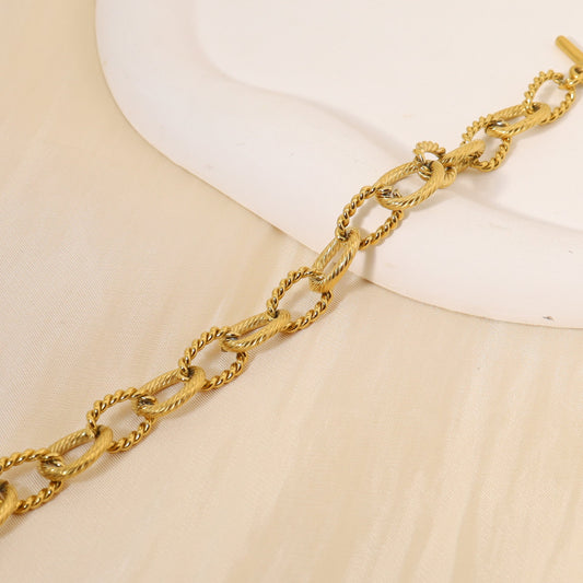 Golden intertwined chain bracelet