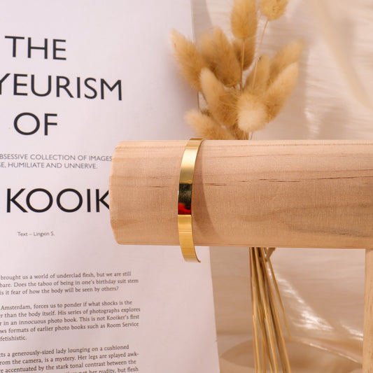 Smooth golden bangle bracelet