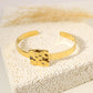 Bracelet jonc doré plaque carré martelé