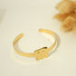 Bracelet jonc doré plaque carré martelé