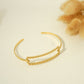 Bracelet jonc doré rectangle long