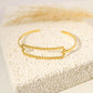 Bracelet jonc doré rectangle long