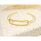 Bracelet jonc doré rectangle long