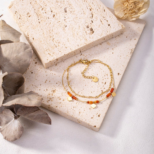 Bracelet pendentif losange et perles de couleur