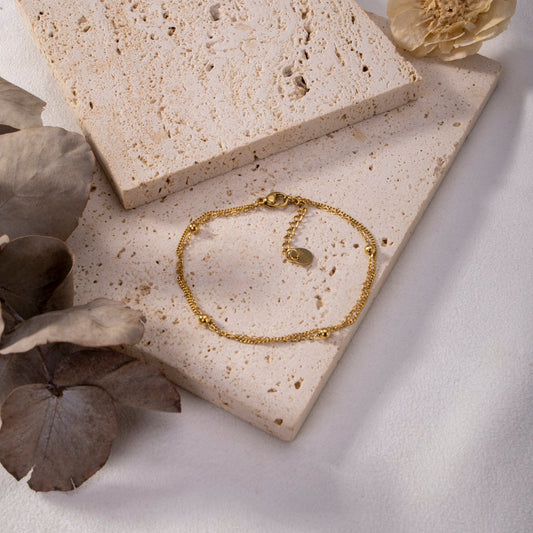 Bracelet boule doré