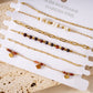 Bracelets multiples noirs losange