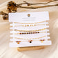 Multiple brown diamond bracelets