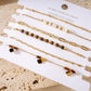 Bracelets multiples noirs losange