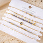 Multiple bracelets black with pearls