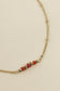 Collier ligne pierres rouges