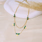 Double chain necklace with red stones