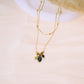 Double chain necklace with red pendants