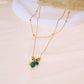 Double chain necklace with red pendants