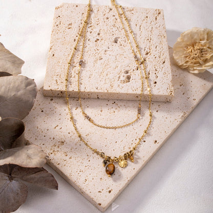 Double chain necklace with colored stone
