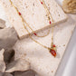 Double chain necklace with colored stone
