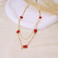 Double chain necklace with 5 golden green stones