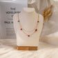 Double chain necklace with 5 golden green stones