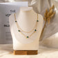 Double chain necklace with 5 blue stones