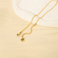 Golden necklace with a pendant circle
