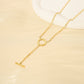 Golden necklace with a pendant circle