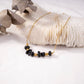Necklace with golden colored stones