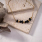 Necklace with golden colored stones