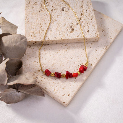 Necklace with golden colored stones