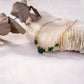 Necklace with golden colored stones