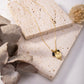 Necklace with leaf pendant and pearl in gold color