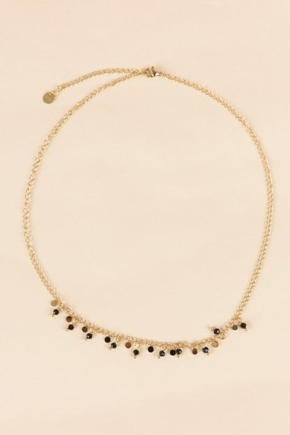 Necklace with mini gold black pendants