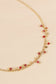 Necklace with mini gold black pendants