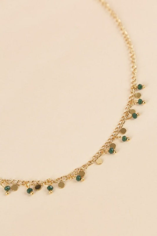 Collier avec mini pendentifs verts dorée
