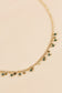 Necklace with mini gold black pendants