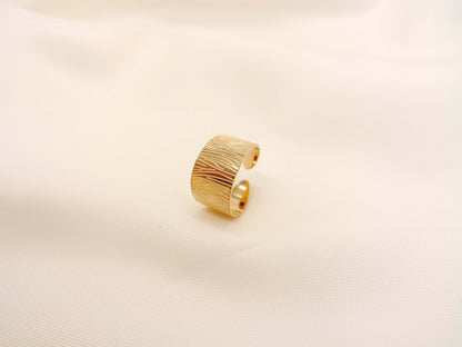 Golden ring with engraving
