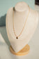 Pearl necklace with clover pendant