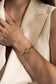 Golden eye pendant bracelet