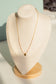 Collier perle avec pendentif rond